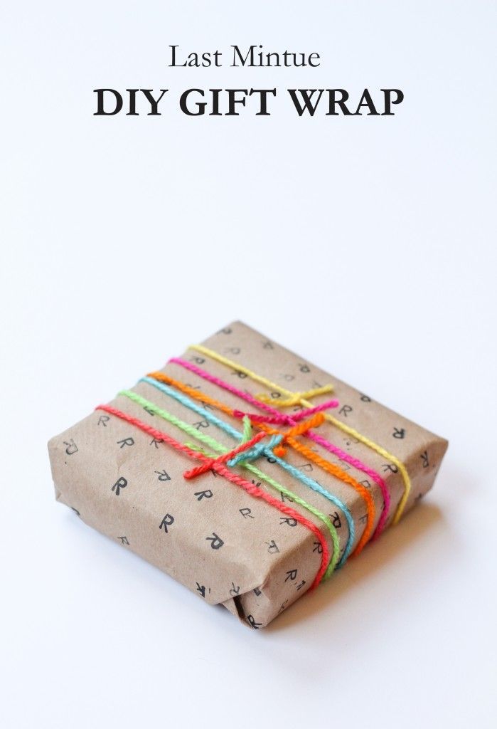 Wrap in stamped brown paper and tie with coloured yarn