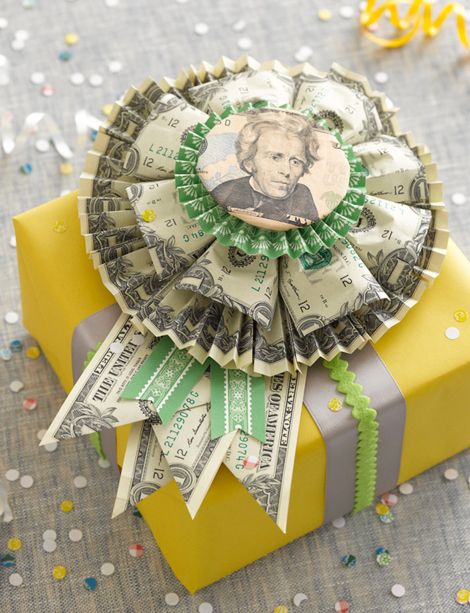 This is the Money Rosette, with full photo instructions, super fun gift topper!