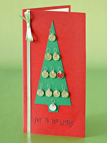 Convey your holiday sentiments with a Christmas tree card decorated with tiny or...