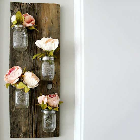 Form meets function in this rustic and adorable Mason jar flower holder.