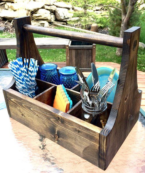 Kitchen or picnic caddy...it would also be great for carrying all your odds and ...