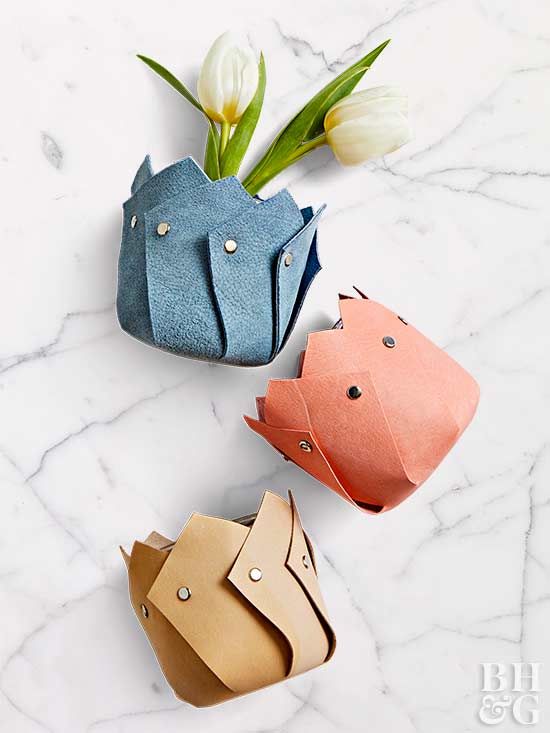 Give a potted plant an instant pick-me-up. These pretty leather vase holders are...