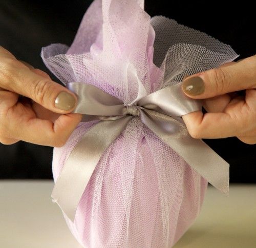 Gift Wrapping Inspiration * Wrapping with Netting and tying off with a satin rib...