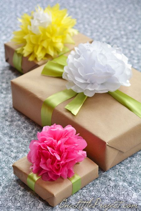 Gift wrapping with tissue paper flowers is a simple way to wrap gifts, but it lo...