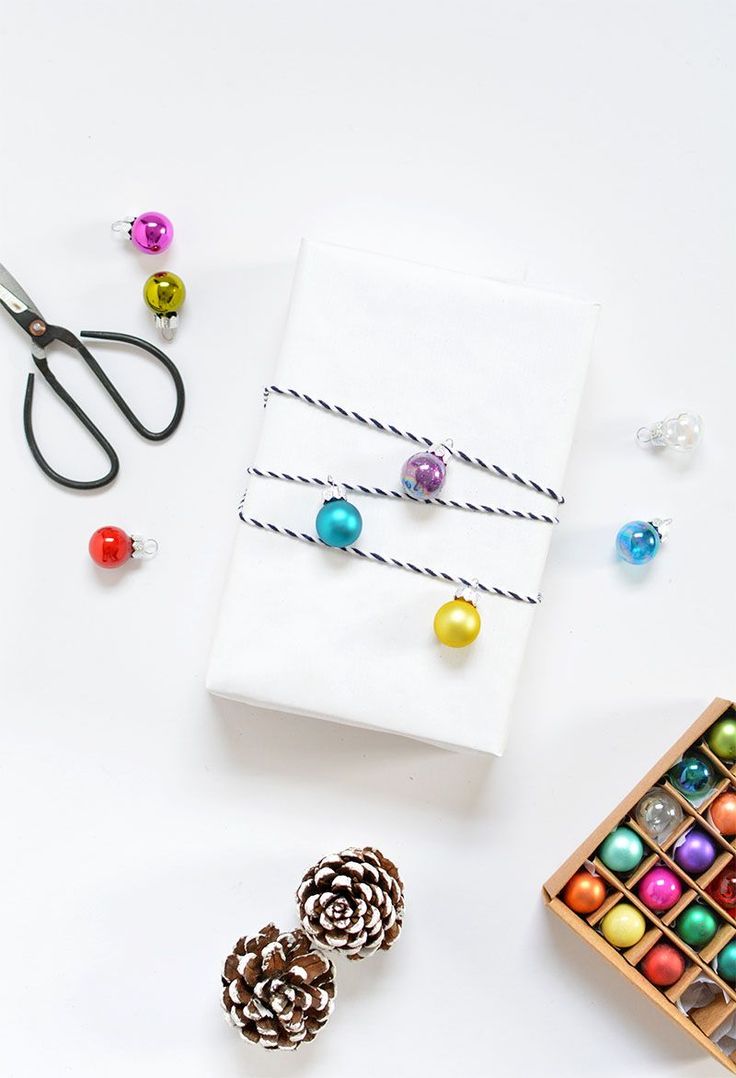minimal gift wrap- white paper and baubles
