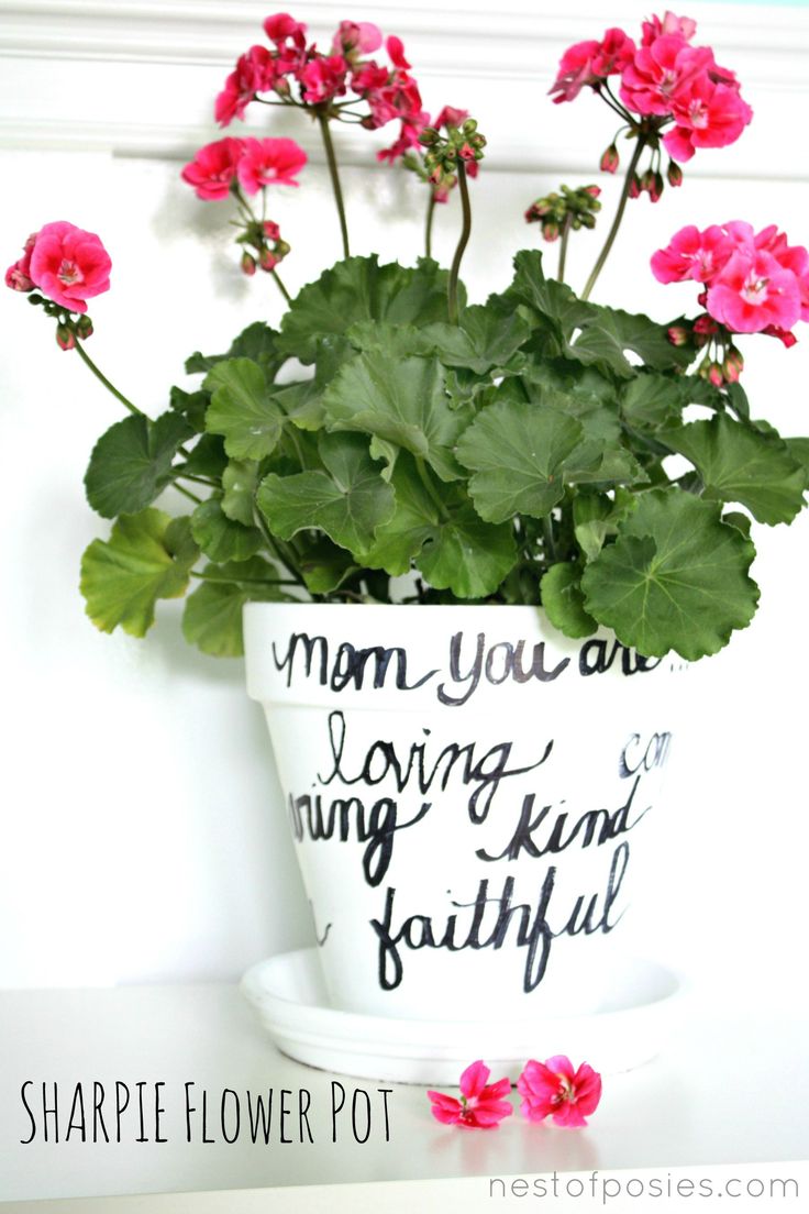 Make a personalized flower pot for Mom!  via Nest of Poises