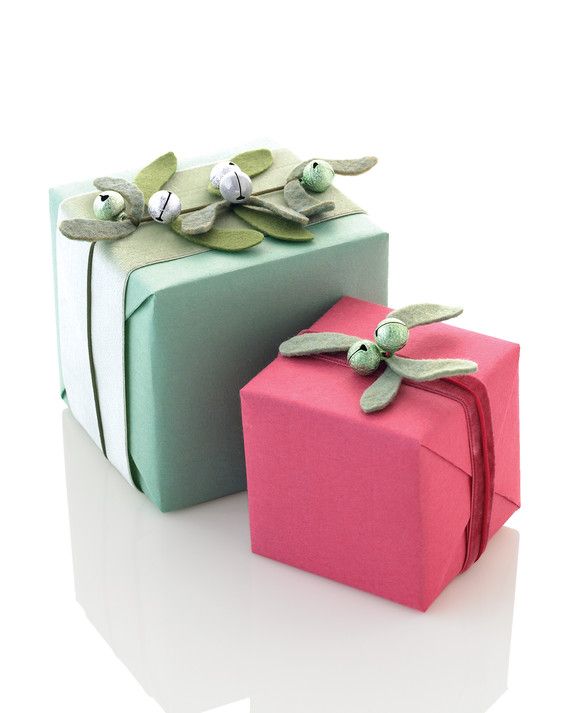 Embellish holiday parcels with mistletoe made from felt leaves.