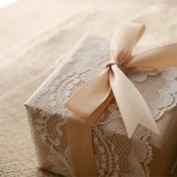 brown packing paper + lace + ribbon.