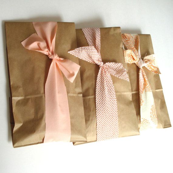 ribbons around paper bags