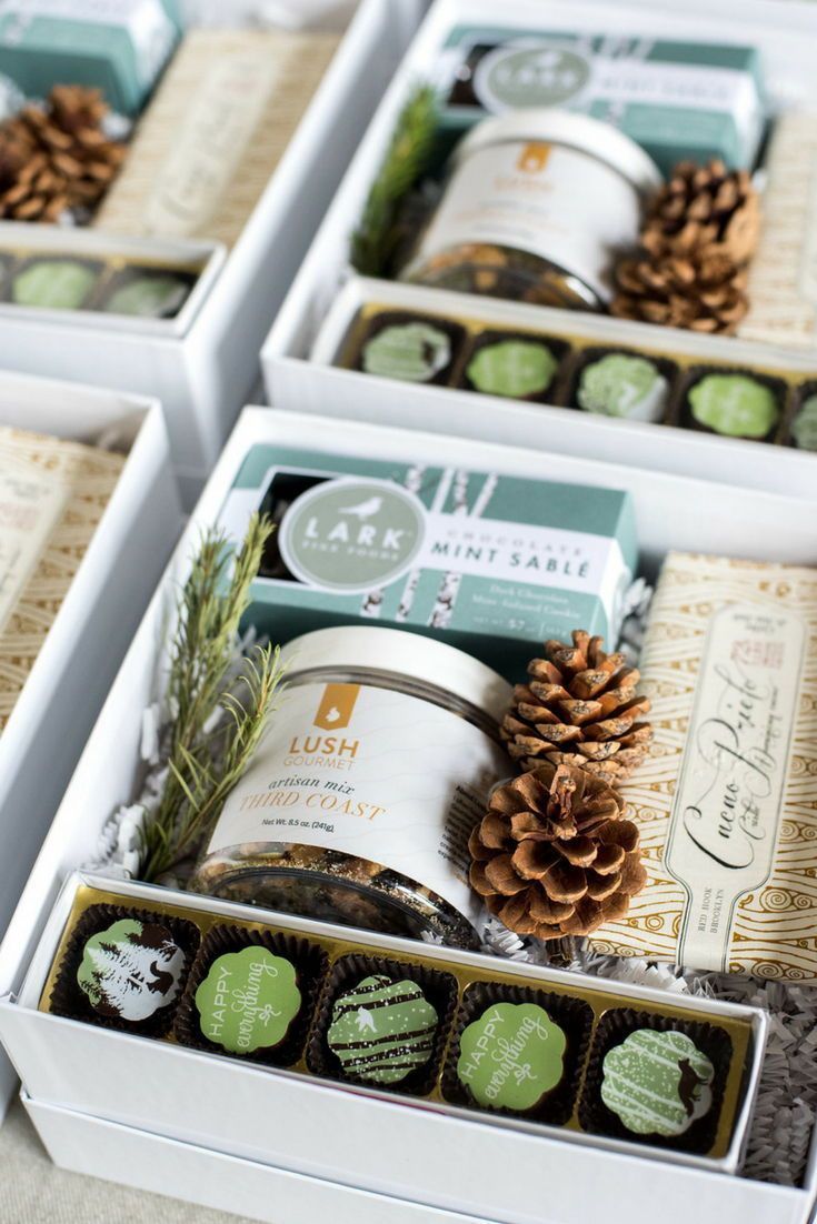 HOLIDAY GIFT BOXES// Custom light green and aqua client holiday gift boxes curat...