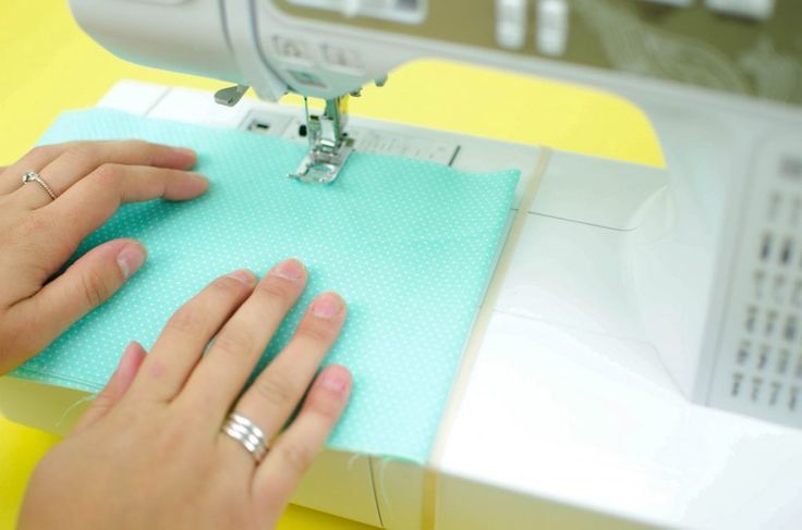 Place a rubber band around the arm of your sewing machine to help you sew straig...