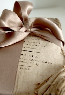 a great taupe satin ribbon and old book pages