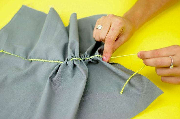 Zigzag stitch over a piece of yarn to create a ruffle.  You'll love these mu...