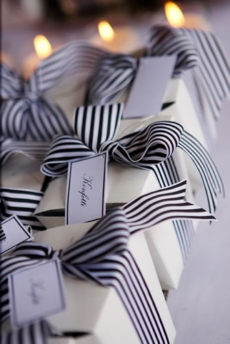 Black and white packages with pretty striped ribbon. We love presents!
