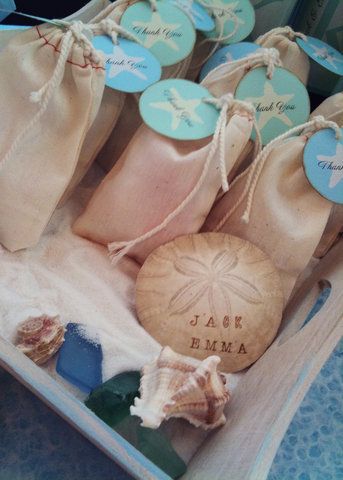wedding favors - fill muslin bags or small mason jars with sand and seashells an...