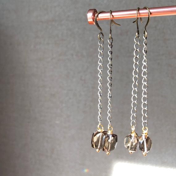 Brilliant smoky quartz gemstone dangle from antique gold plated chain in these b...