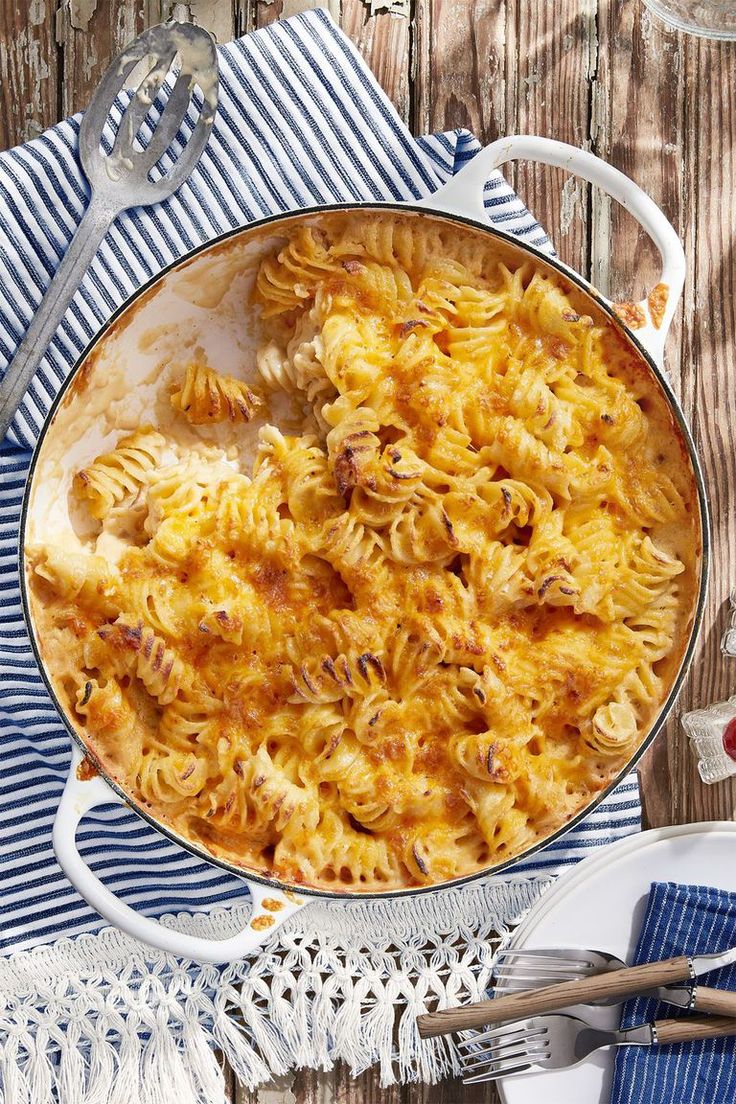 A creamy baked mac and cheese is a delicious comfort food dish to serve at Mothe...