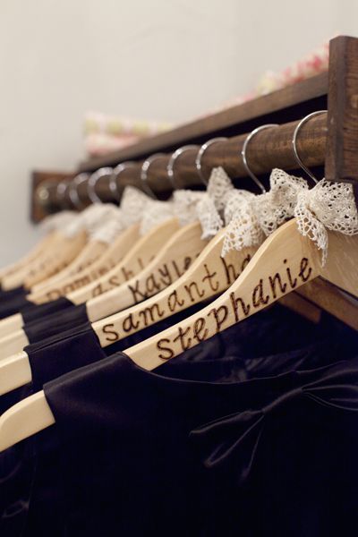 Keep track of bridesmaids' dresses. Paint and decorate hangers for them to take ...