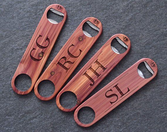 This industrial grade wood bottle opener was made with Aromatic Cedar wood, and ...
