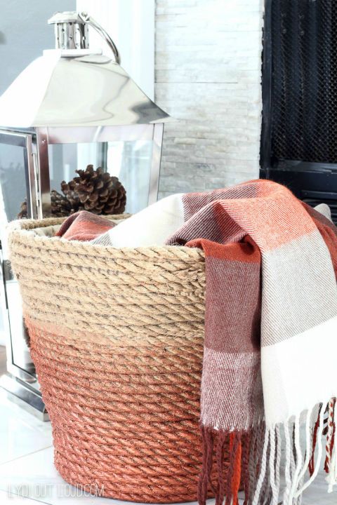DIY Rope Throw Basket:  Give her a stylish place to put her throw blankets and p...