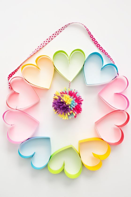 Every fun-loving mom will want to hang up this rainbow wreath on Mother's Day.  ...
