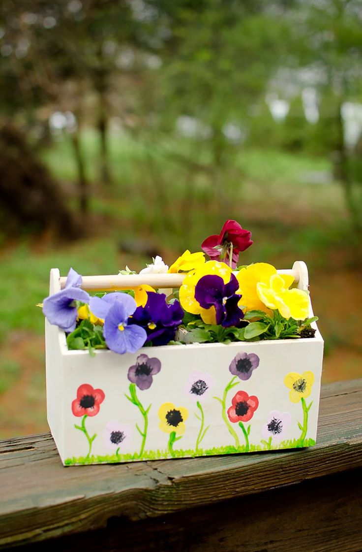 Mom will think this DIY thumbprint planter is the cutest homemade Mother's Day g...