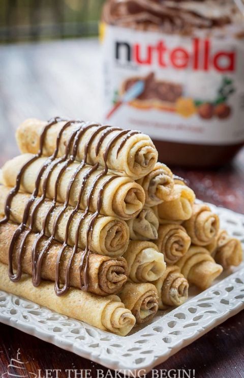 Nutella Stuffed Crepes:  This crepe roll-ups are made even better with lots of N...