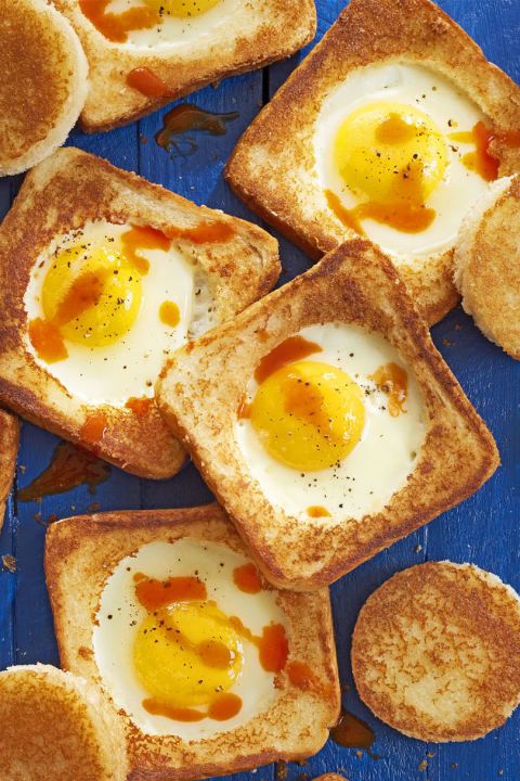 Parmesan Egg-in-a-Hole:  Topped with parmesan cheese and hot sauce, these adorab...
