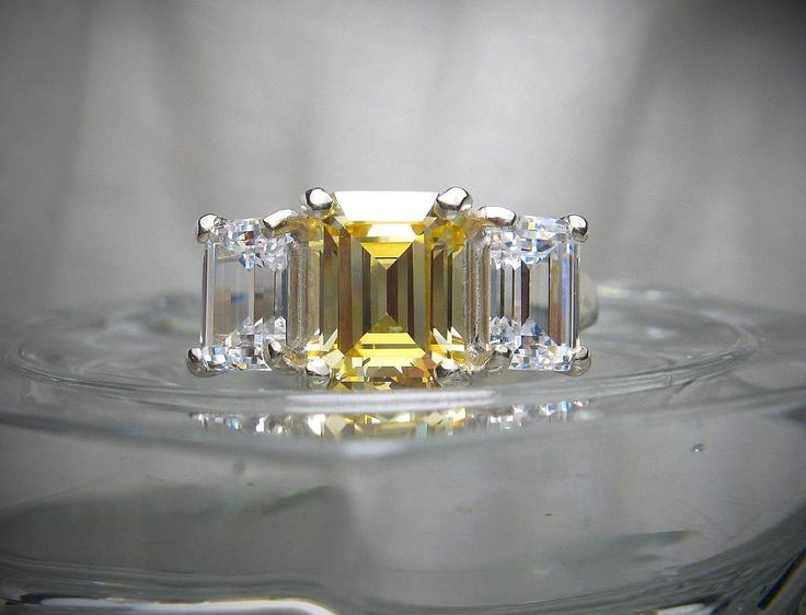 A 4.5TCW Emerald Cut Russian Lab Diamond Journey Ring
