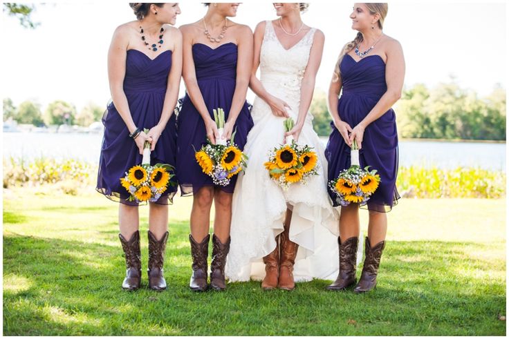 Purple Bridesmaids Dresses with Cowboy boots and Sunflower bouquets.