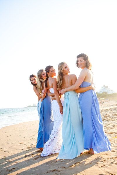 The idea is that each bridesmaids dress is a lighter hue until the bride in whit...