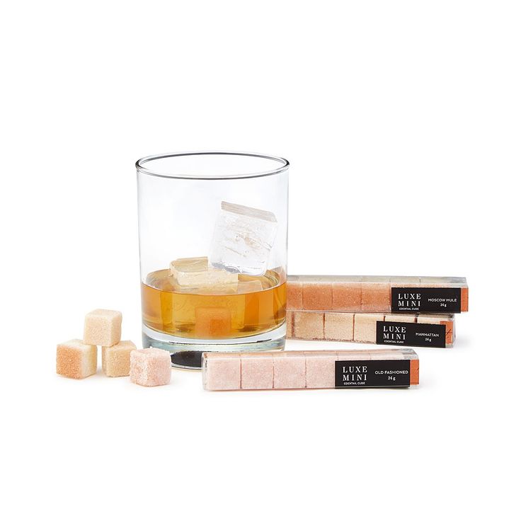 Drop one cocktail cube into a shot of liquor, let it sit for a minute or two, an...