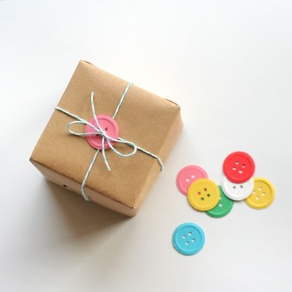 Use (handmade paper) buttons to wrap up a gift