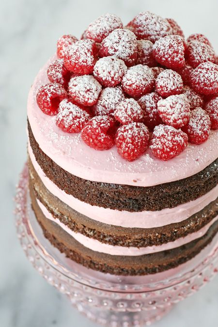 Chocolate and fresh raspberries with raspberry buttercream are a match made in M...