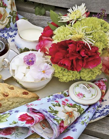 Choose floral-print paper party napkins, or make your own from a remnant of cott...