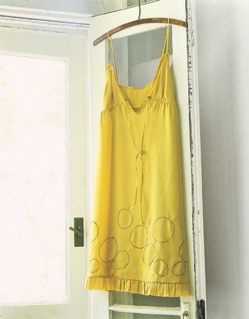 Create a Yellow Polka-Dot Dress by using paper circles, pinned on the fabric, as...
