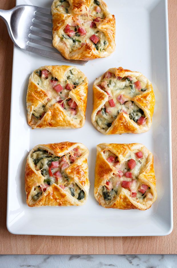 Ham, cheese, and spinach are mixed with white sauce and wrapped into thin sheets...