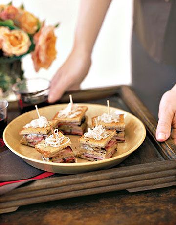 Mini Triple-Decker Pastrami Reuben Sandwiches are stuffed with quality deli sele...