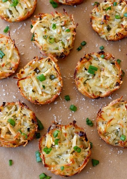 Grab one—or two!—of these cheesy hash brown cups topped with fresh scallions...