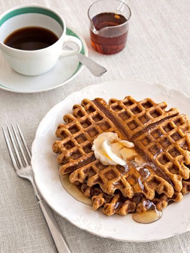 Pumpkin-Ginger Waffles has an unexpected punch of crystallized ginger gives tend...