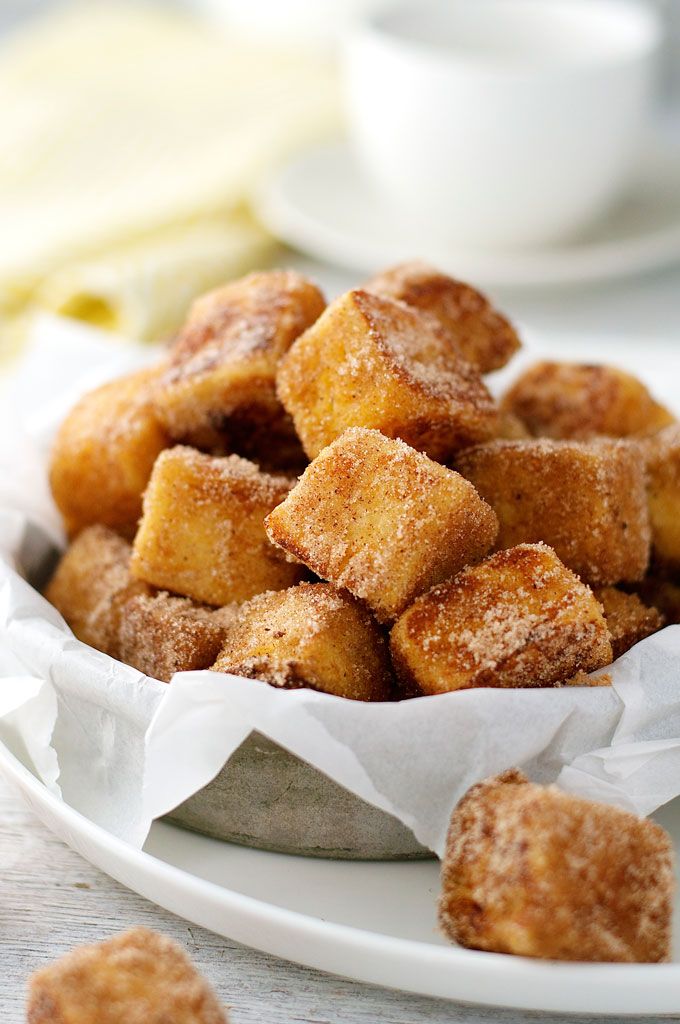 Put out a plate of bite-sized, sugar-covered French toast pieces as a brunch-fri...