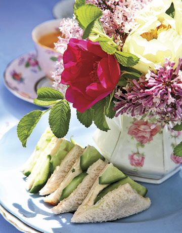 Served with tea—small sandwiches, mini cookies, and tiny tarts—sweeten the p...