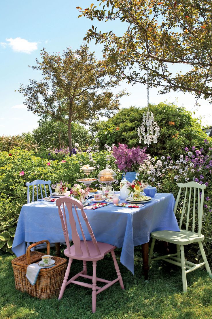 Set the scene with a pastel table adorned with English rose motifs, floral-print...