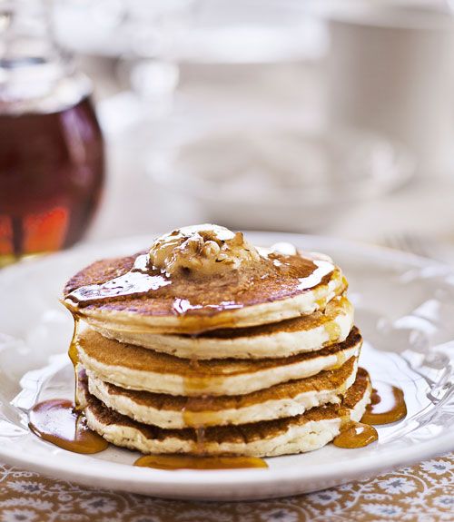Sour-Cream Pancakes with Maple-Pecan Butter are rich and fluffy for the perfect ...