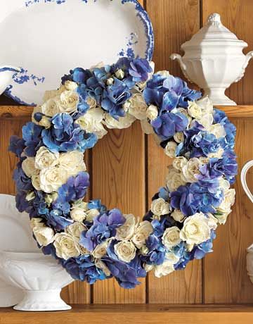 This DIY Blue & White Wreath is made from white spray roses and blue hydrangeas.