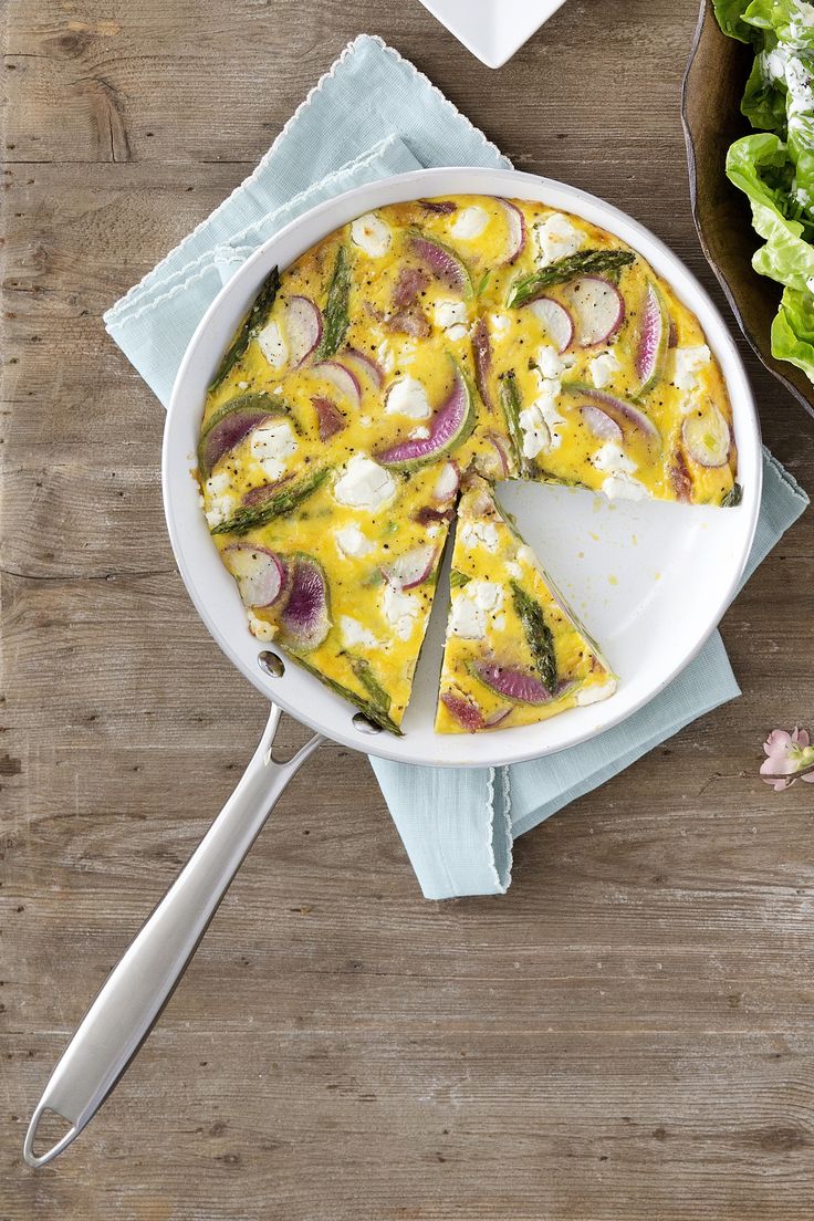 This Spring Vegetable, Ham, and Goat Cheese Frittata can easily feed a crowd.