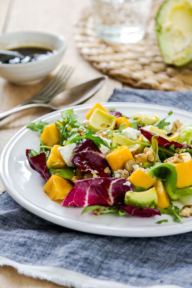 This easy Arugula, Mango, and Blue Cheese Salad looks beautiful once assembled a...