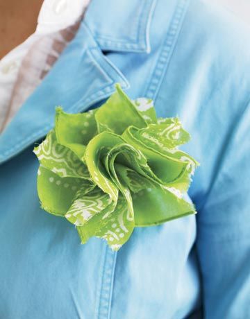 To create a homemade Rosette Pin cut a bandanna into eight equal-sized squares. ...
