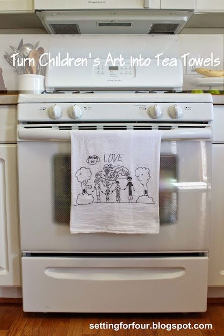 Use a Sharpie laundry marker to trace kids' artwork onto a white dishtowel f...