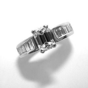 A Perfect 2.2CT Emerald Cut Russian Lab Diamond Ring with Channel Set Baguettes